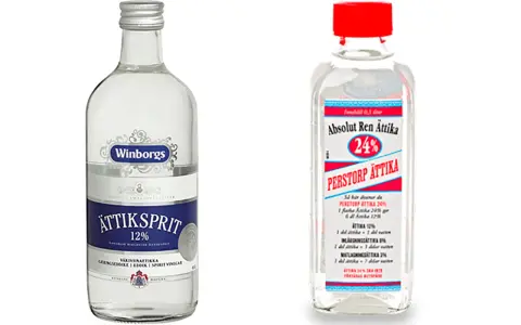 Två flaskor ättiksprit, en med 12% och en med 24%. Perfekt för inläggningar och matlagning, precis som vinagre blanco para que sirve.
