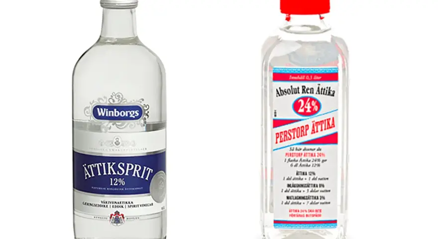 Två flaskor ättiksprit, en med 12% och en med 24%. Perfekt för inläggningar och matlagning, precis som vinagre blanco para que sirve.